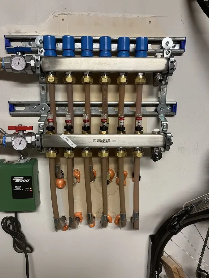 Plumber performing Gas Line Installation at a residential property in Bayville